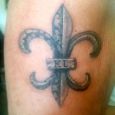 Fleur de lis i sten